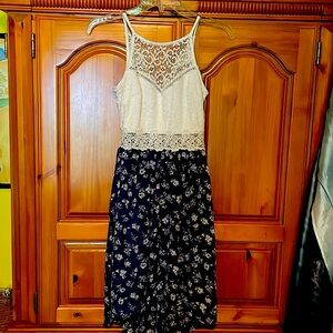 Dress with white lace and French blue attached skirt with white flowers.